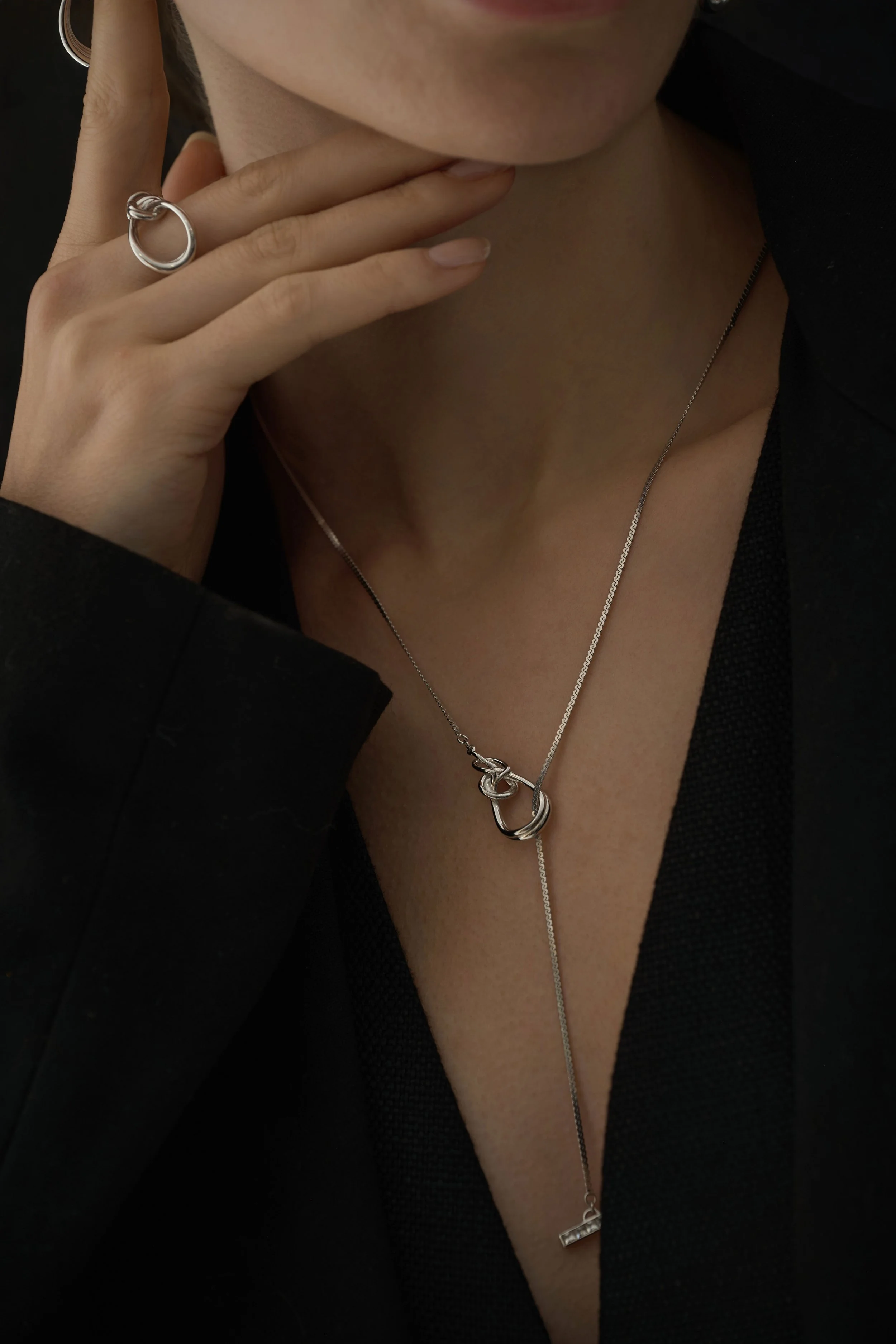 On-model jewellery photography for e-commerce websites, showcasing necklace and ring styling for online stores