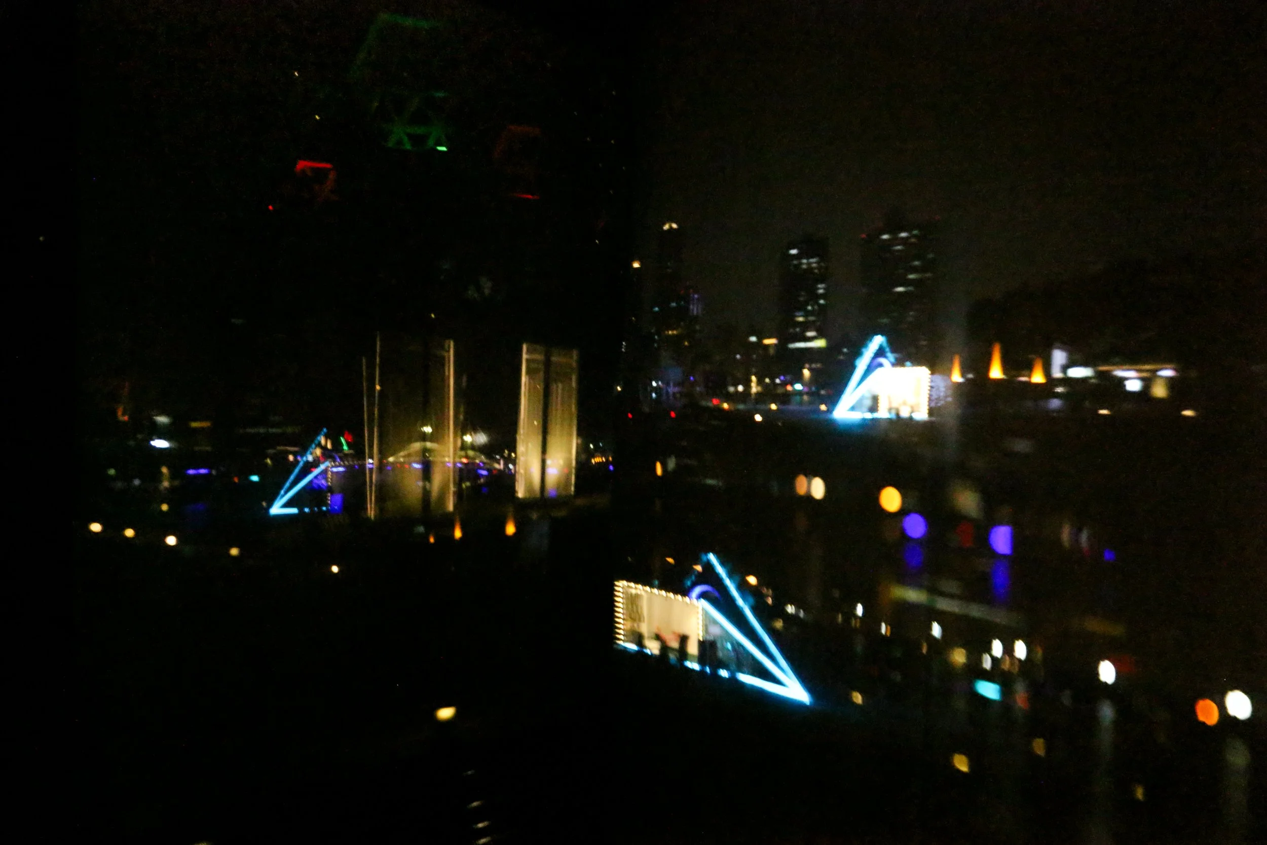 Close-up of a multiple projection of the night scene, showing the lit up structures of the area. By Autistic architect and artist, Troels Steenholdt Heiredal