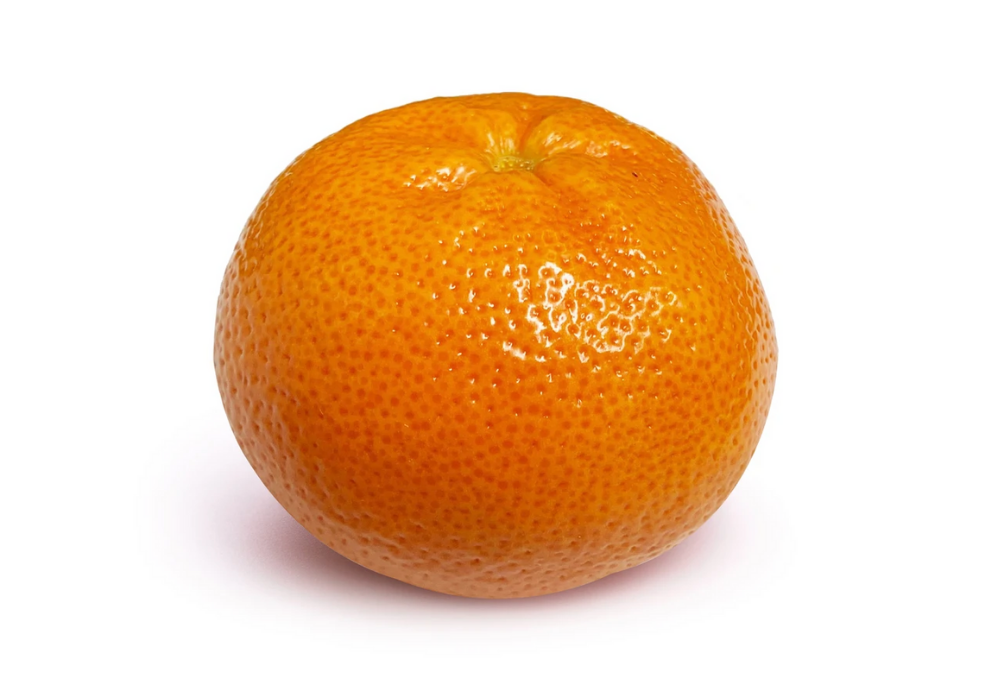 Close-up of an orange citrus fruit with a textured skin on a white background.