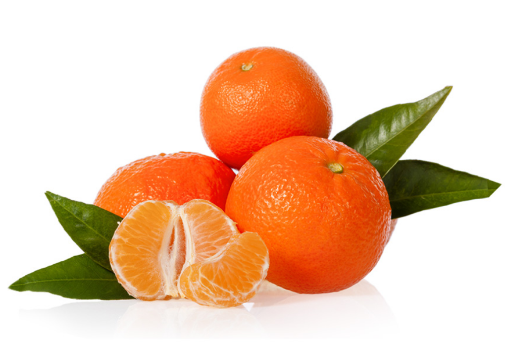 Three whole oranges with green leaves and a peeled orange segment on a white background.