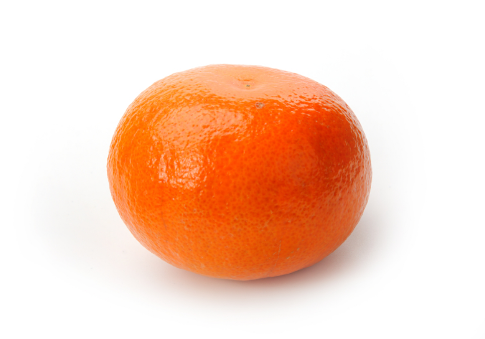 A close-up of an orange fruit on a white background.