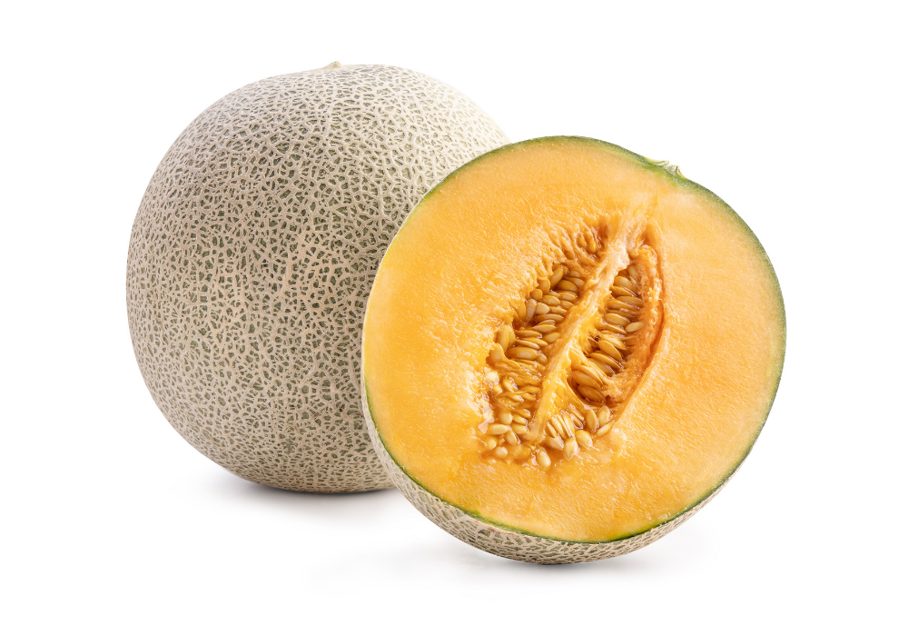 Whole cantaloupe melon next to a halved cantaloupe showing orange flesh and seeds inside.