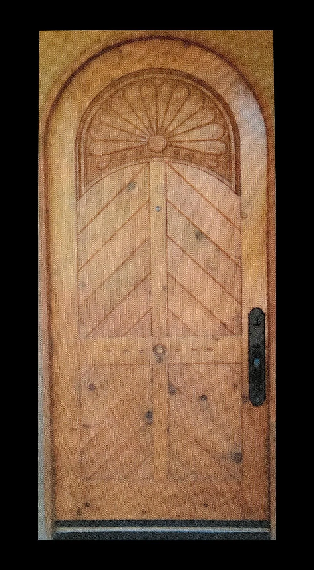 custom-door-carving-herringbone-arched_1.jpg