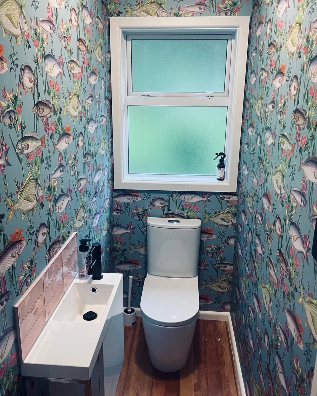 Fishy business in this W/C upgrade. Floors beautifully finished by James Henry NZ #jameshenrynz #toilets #wallpaperdecor #walldecoration
