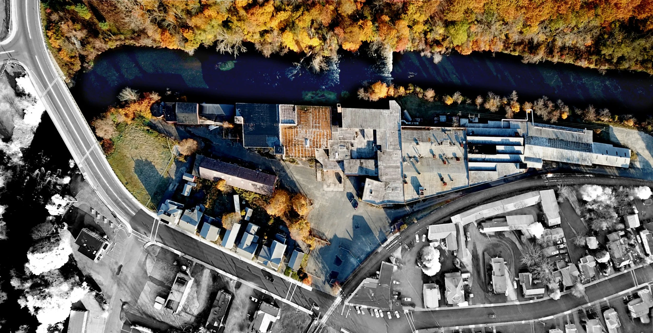 Drone camera view of Eagle Mill Site and surrounding town.