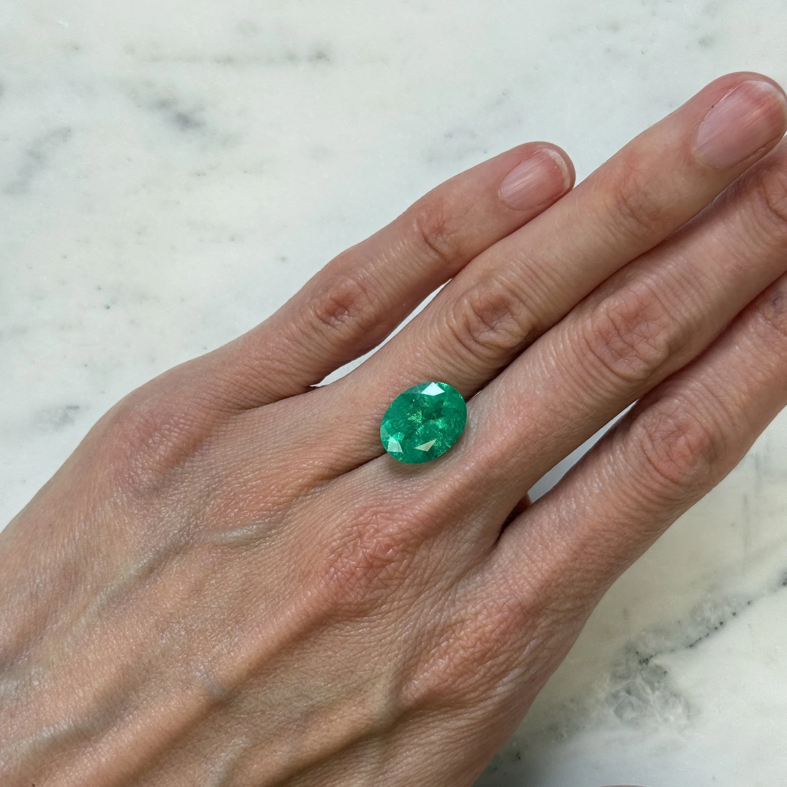 Emerald on hand.jpg