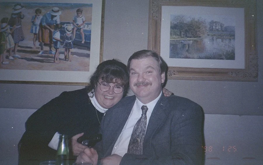 a man and woman at a birthday party in 1998