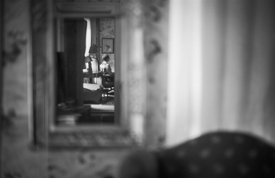 figure-in-mirror-old-house.jpg
