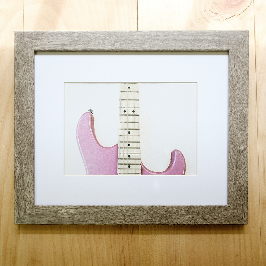 S Lawhorne Photography - Fuzzys Pink Squier Stratocaster Framed.png