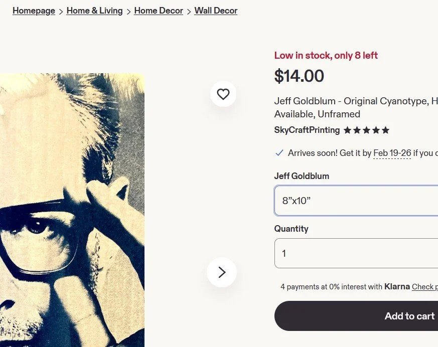 A screenshot of an Etsy listing showing the price and size of the product. There is a partial photograph of a man wearing glasses.
