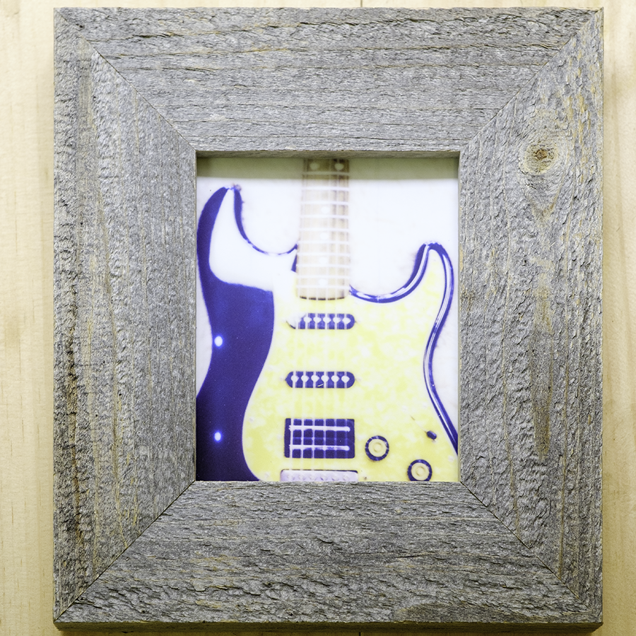 S Lawhorne Photography - Fuzzys Black Squier Stratocaster Framed.png