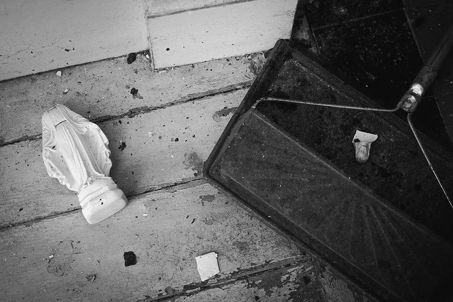 S Lawhorne Photography | broken-religious-statue-in-dustpan.jpg