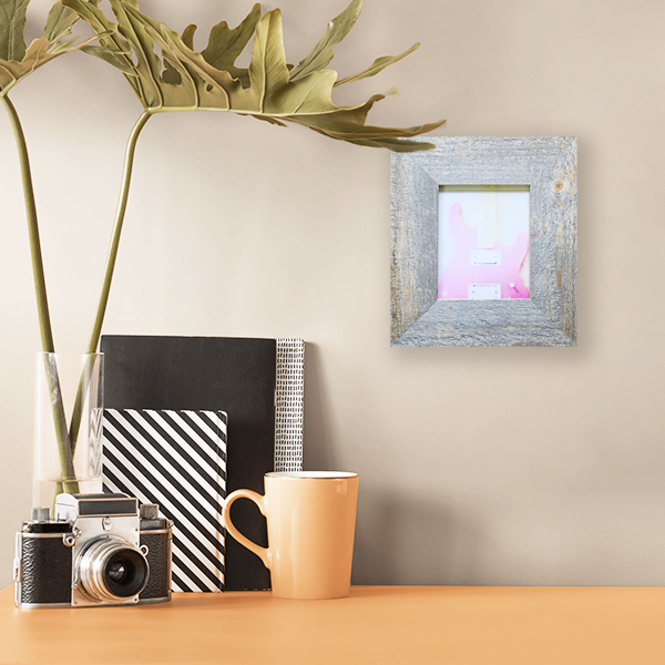 S Lawhorne Photography - Fuzzys Pink Squier Stratocaster Polaroid in situ.png