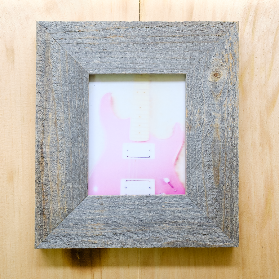 S Lawhorne Photography - Fuzzys Pink Squier Stratocaster Polaroid Framed.png