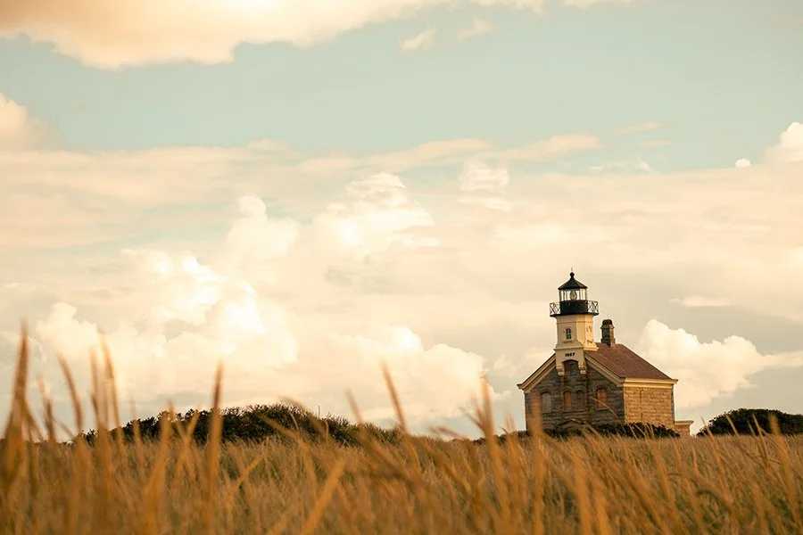 Block Island's North Lighthouse in golden hour light.