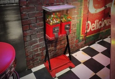 Two Gumball Dispensers on a Standard.jpg