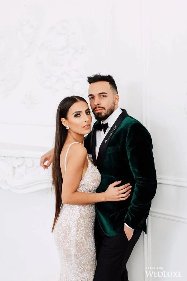 DJ Joe Ghost posing next to his beautiful wife in Toronto.