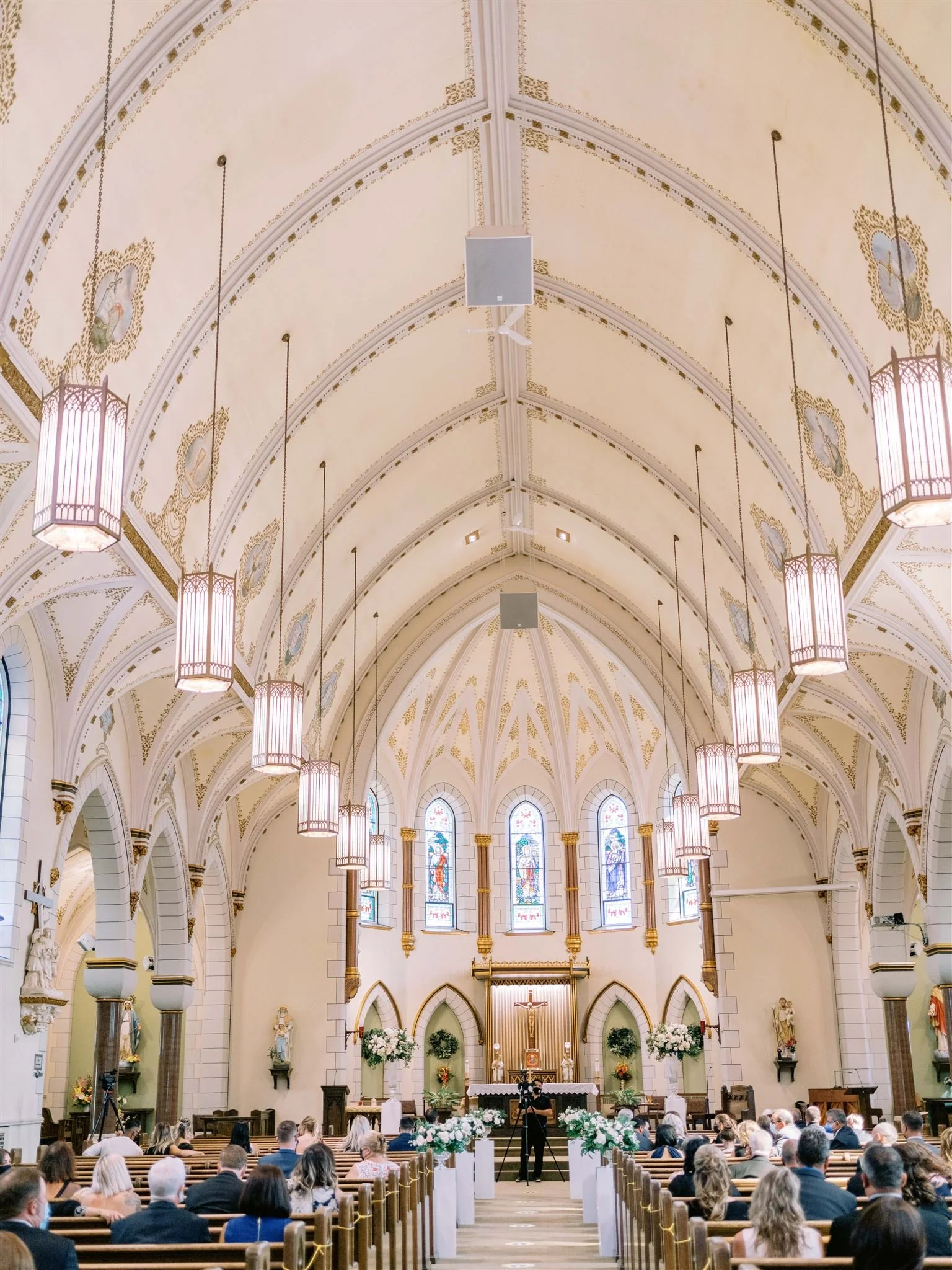 A gorgeous view of the inside of the Church while guests await the arrival of the bride.
