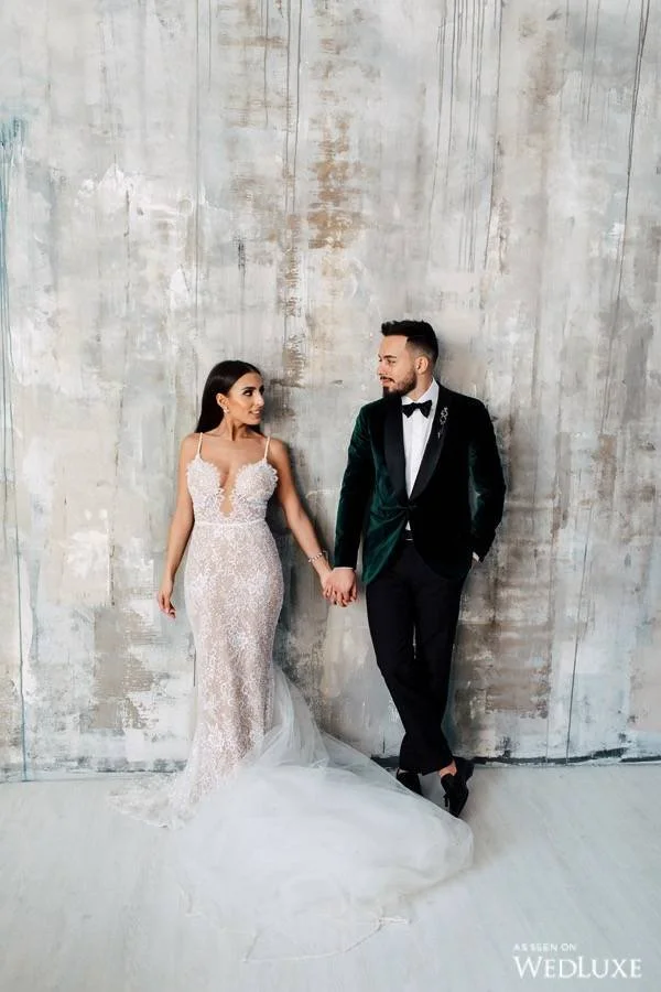 DJ Joe Ghost posing next to his wife at the Mint Room, Toronto.