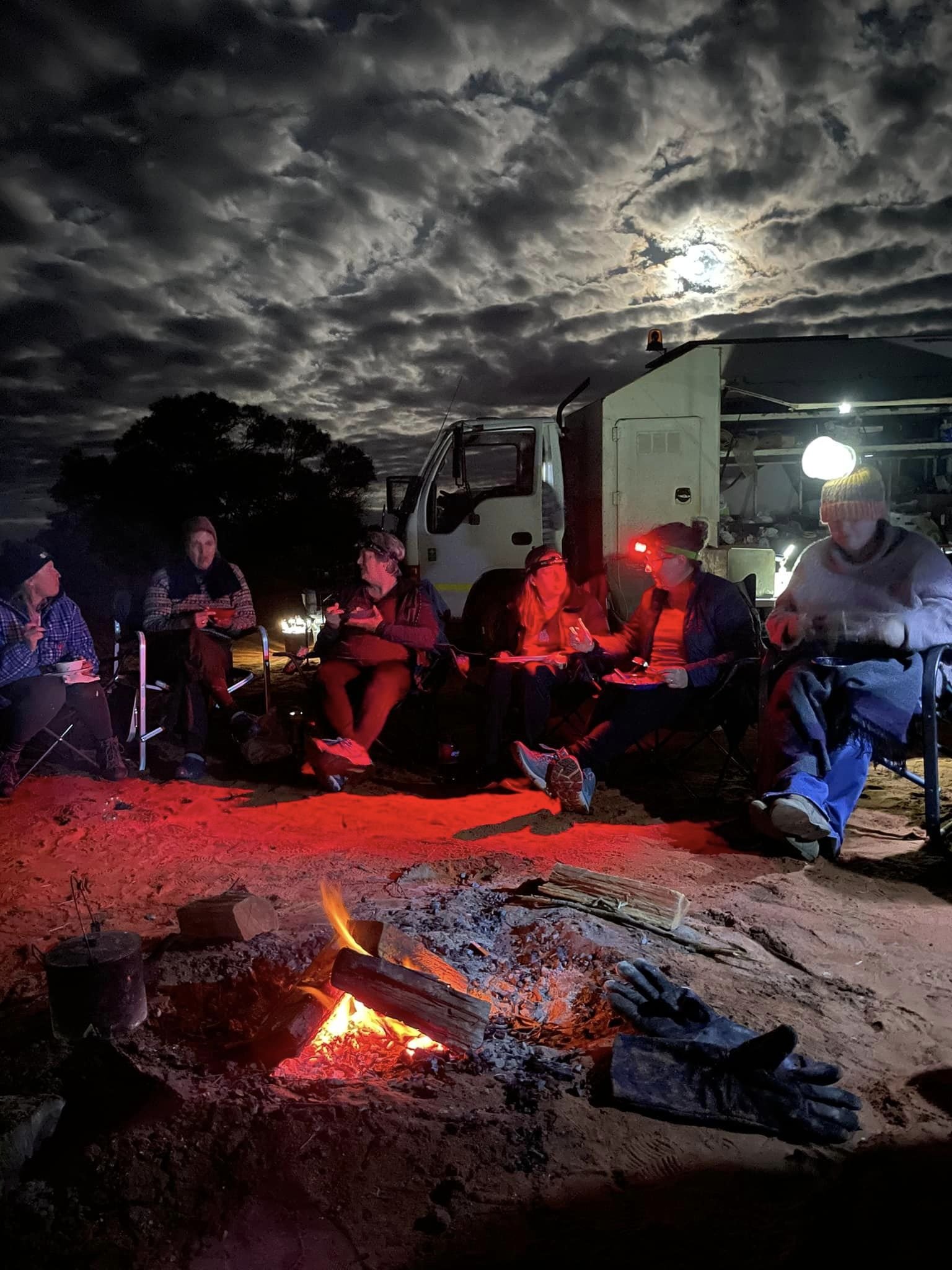 Around the campfire at full moon - image courtesy of Jodie Warrick, 2022