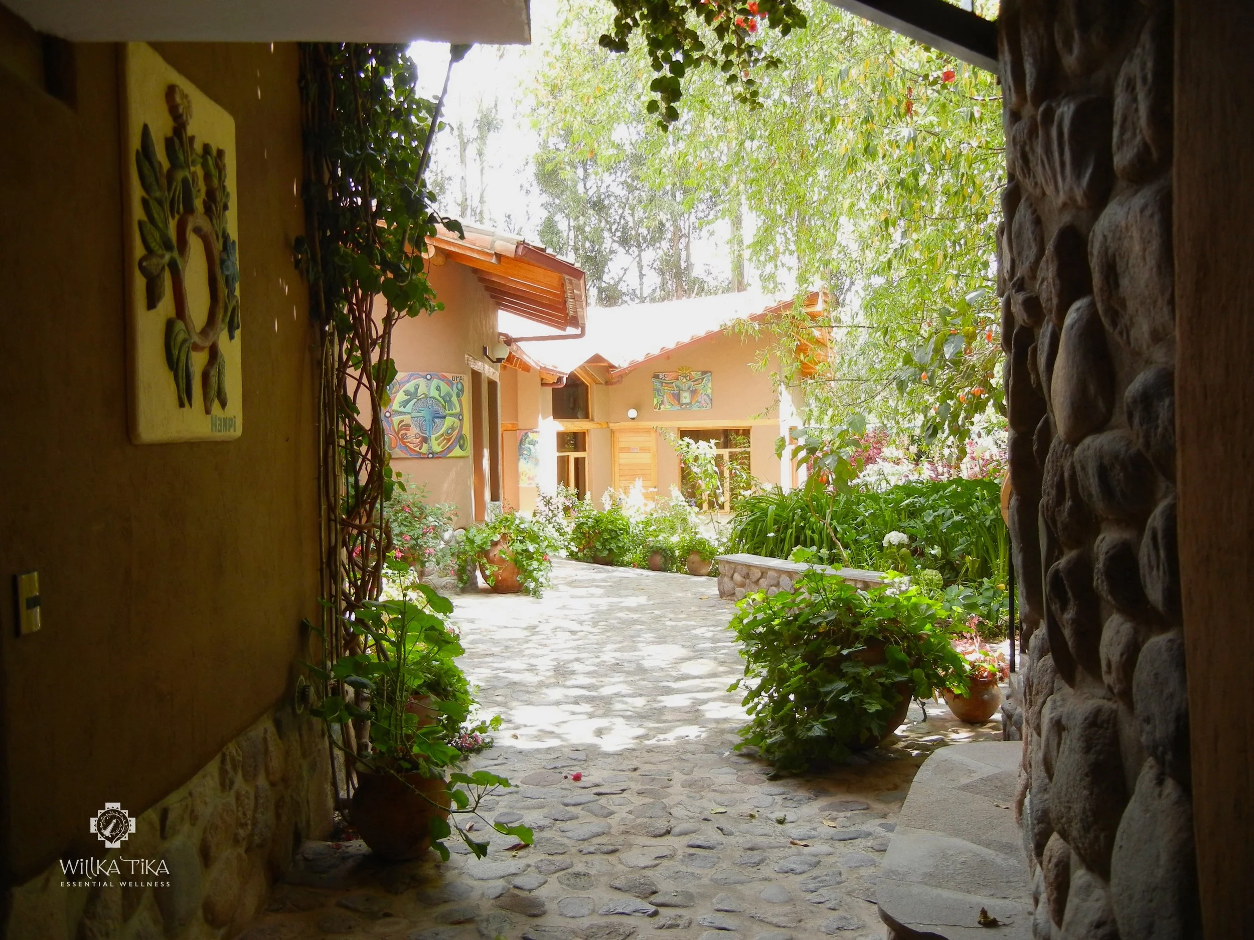 Exterior GuestRooms by Crown Chakra Garden.JPG