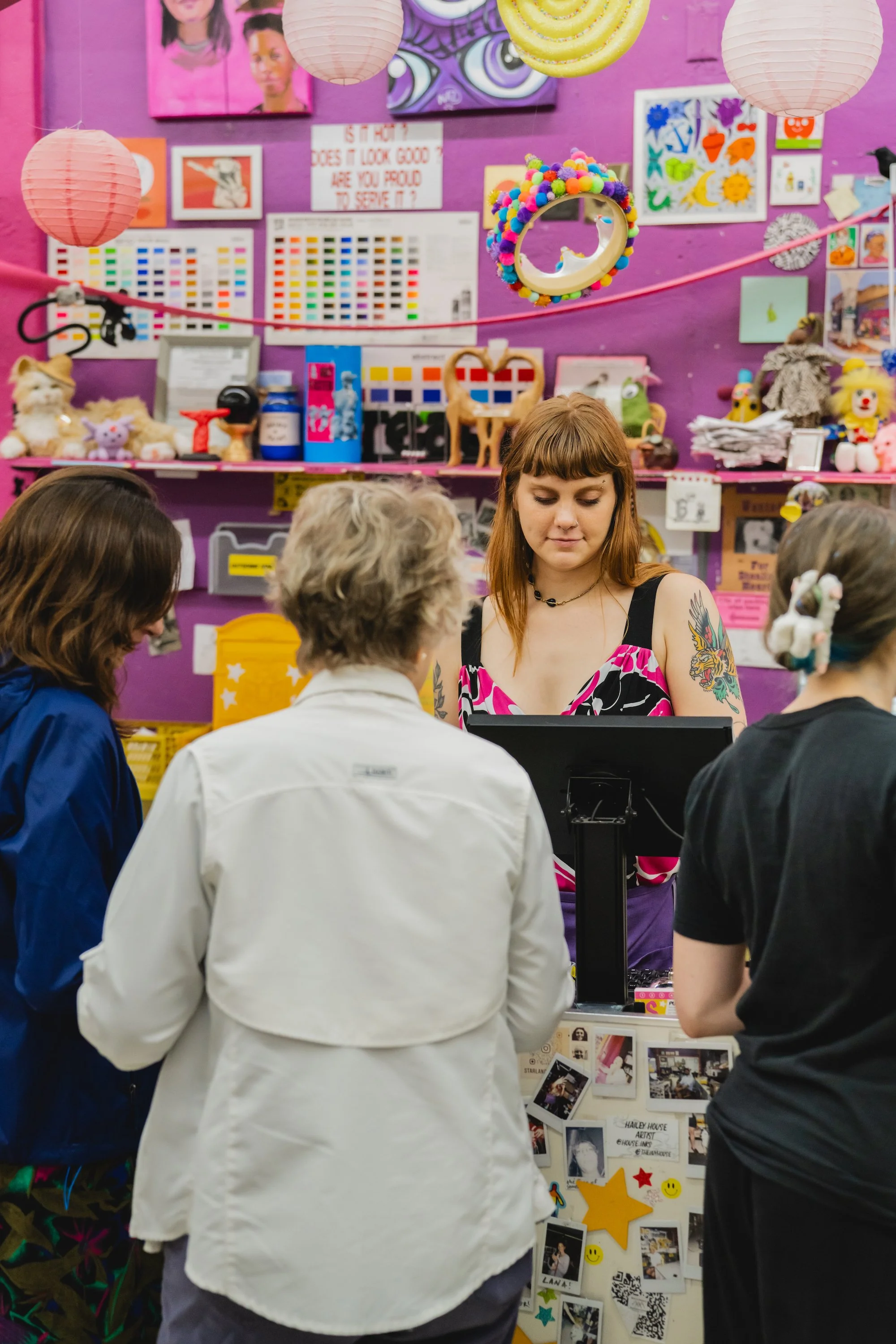 SCAD students browsing reclaimed art supplies at Starlandia before back to school