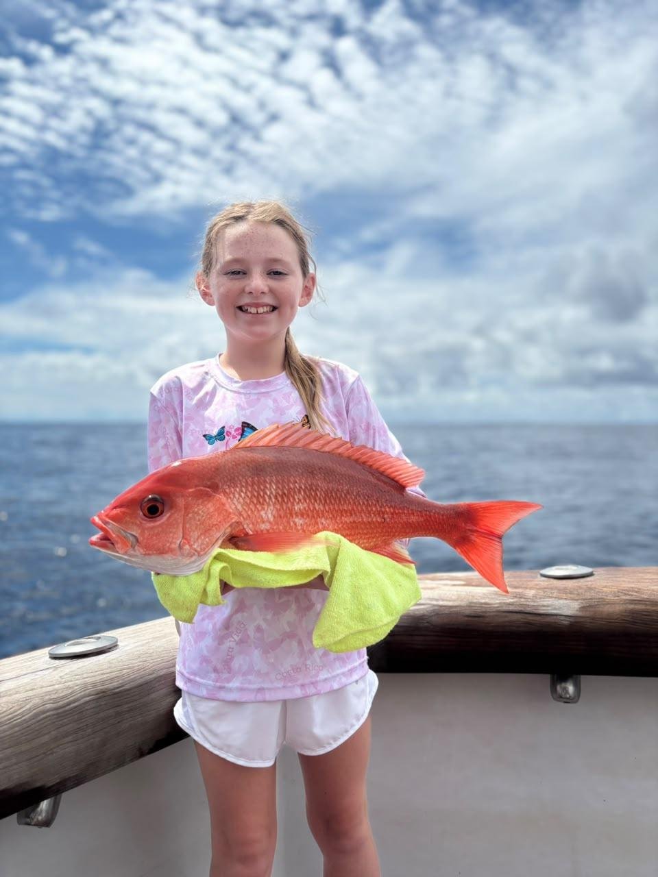 girl-with-red-snapper-catch.jpg