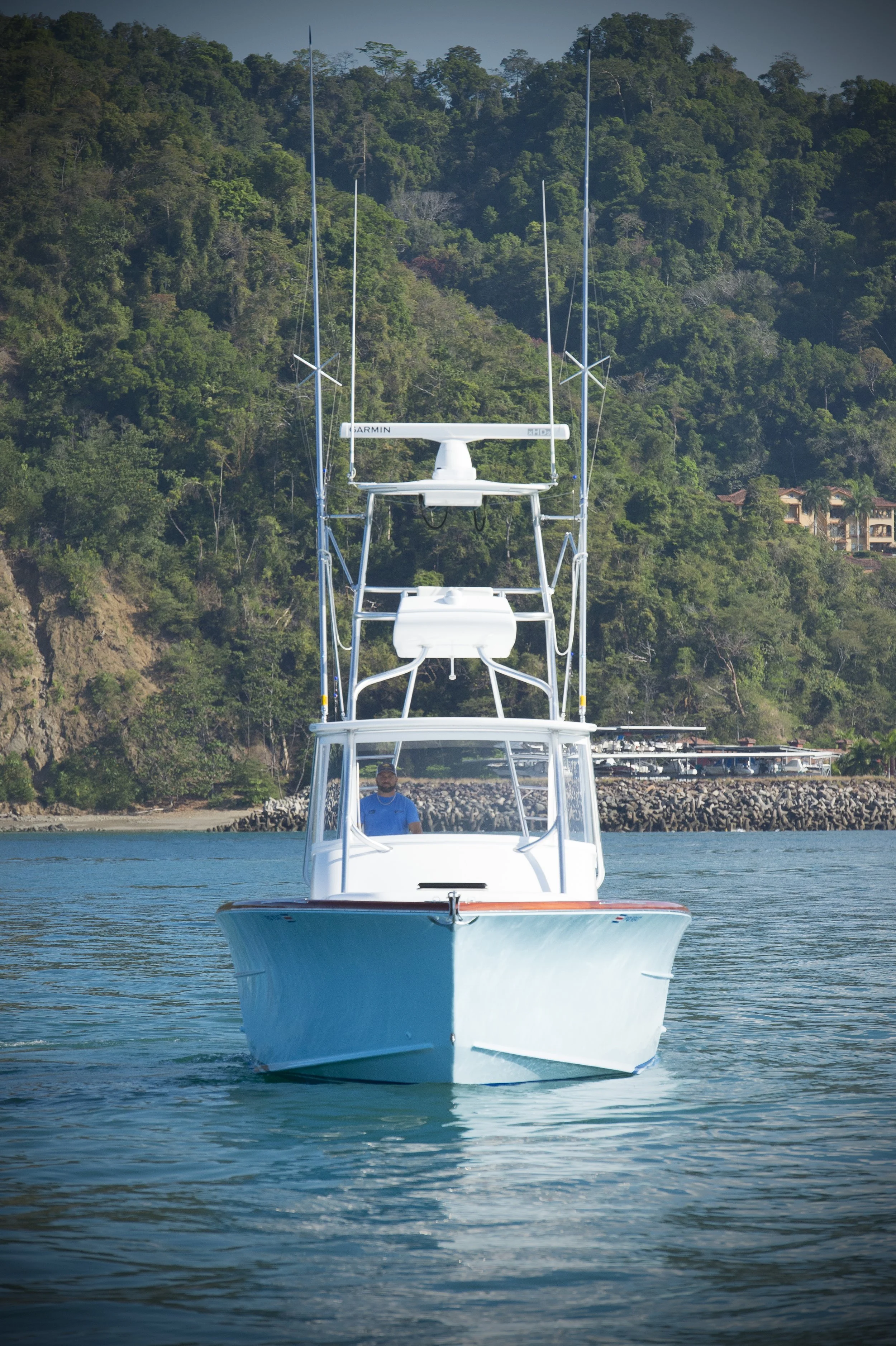 man driving boat