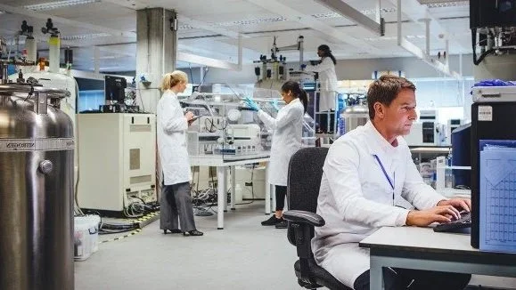 Lab technician analyzing samples at a certified testing laboratory