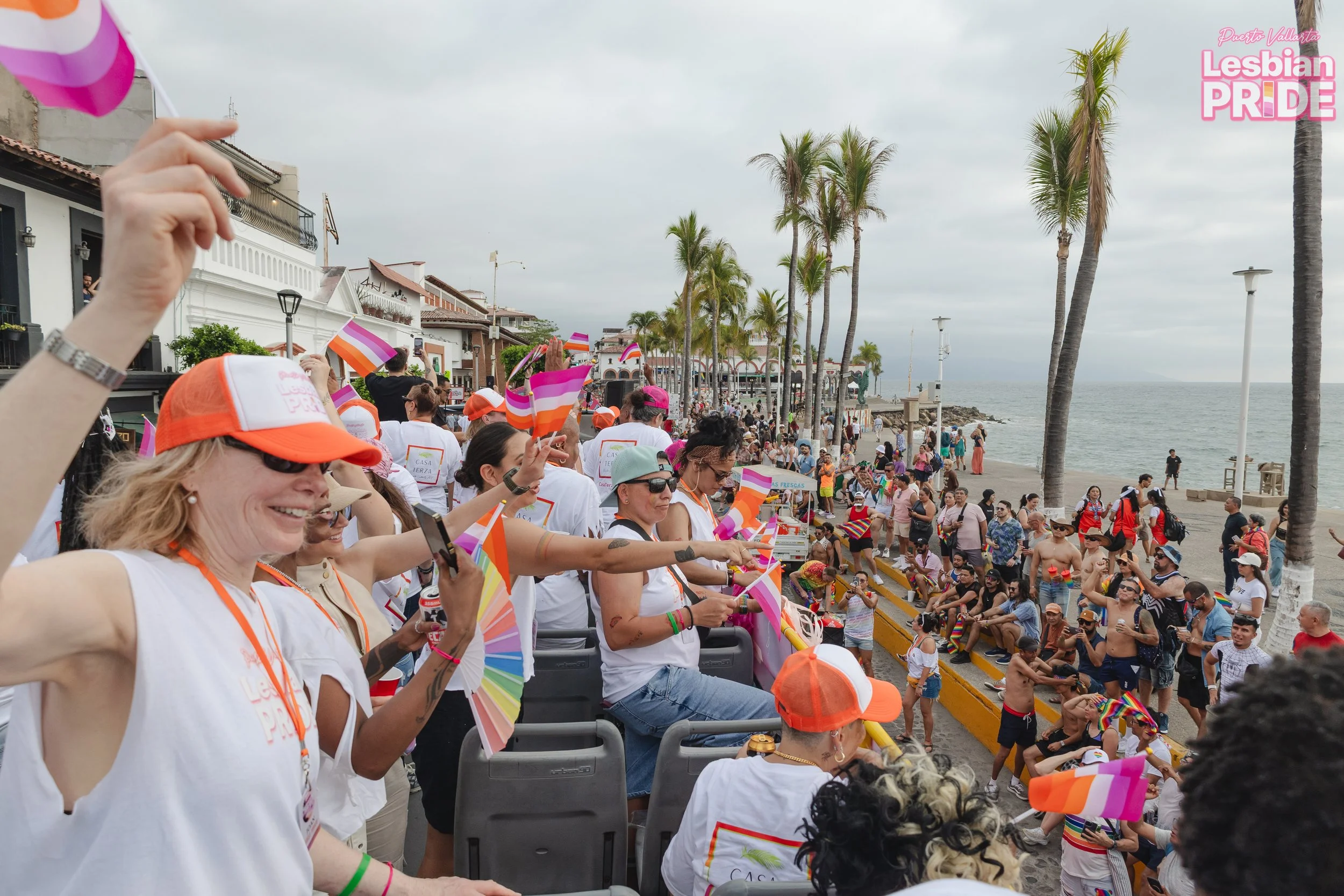Lesbian travelers celebrating Puerto Vallarta Lesbian Pride parade with Ladies Touch Travel