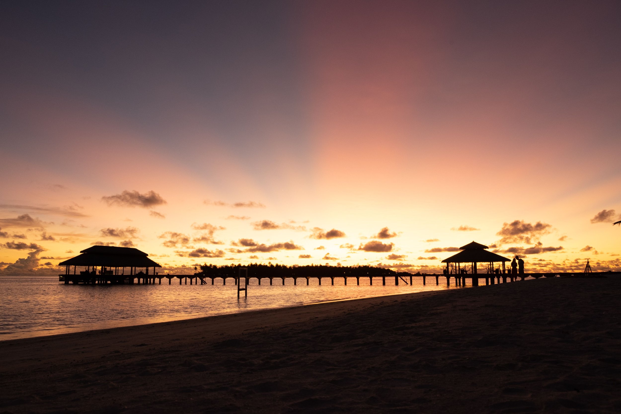 a sunset view in Tahiti during a Ladies Touch Travel group trip