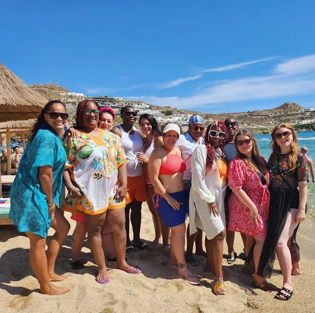 LGBTQ women group travel celebrating together romantic destination
