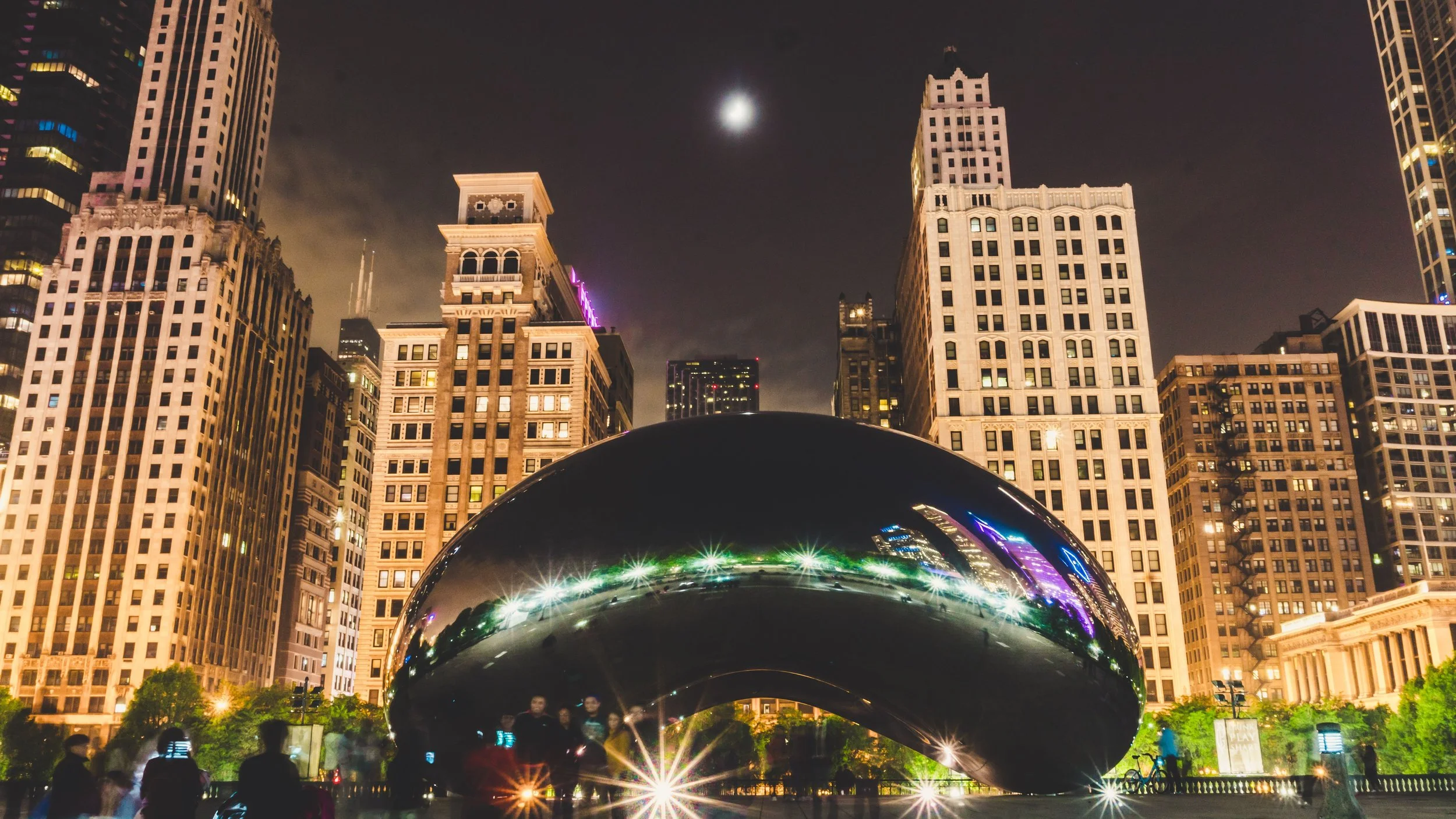 LGBTQ women group travel Chicago skyline sunset