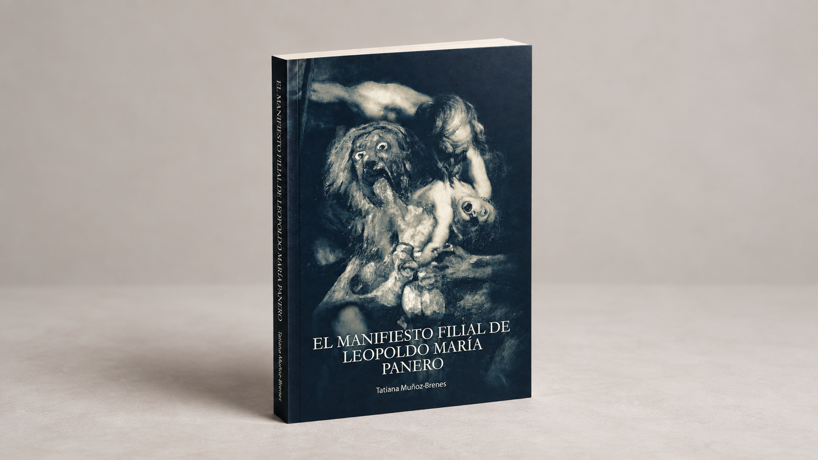 Libro sobre superficie cuya portada es una mezcla de Saturno devorando a su hijo de Goya y la versión de Pedro Pablo Rubens