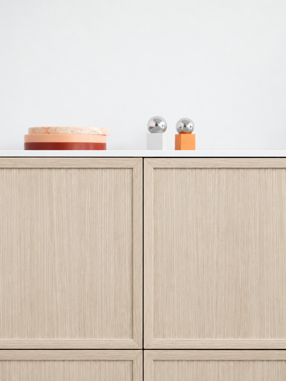 Warm beige woodgrain kitchen cabinetry.png