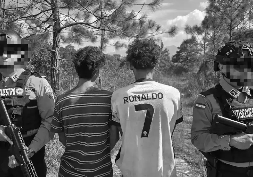 Young people in Siguatepeque, Honduras, standing next to the police.