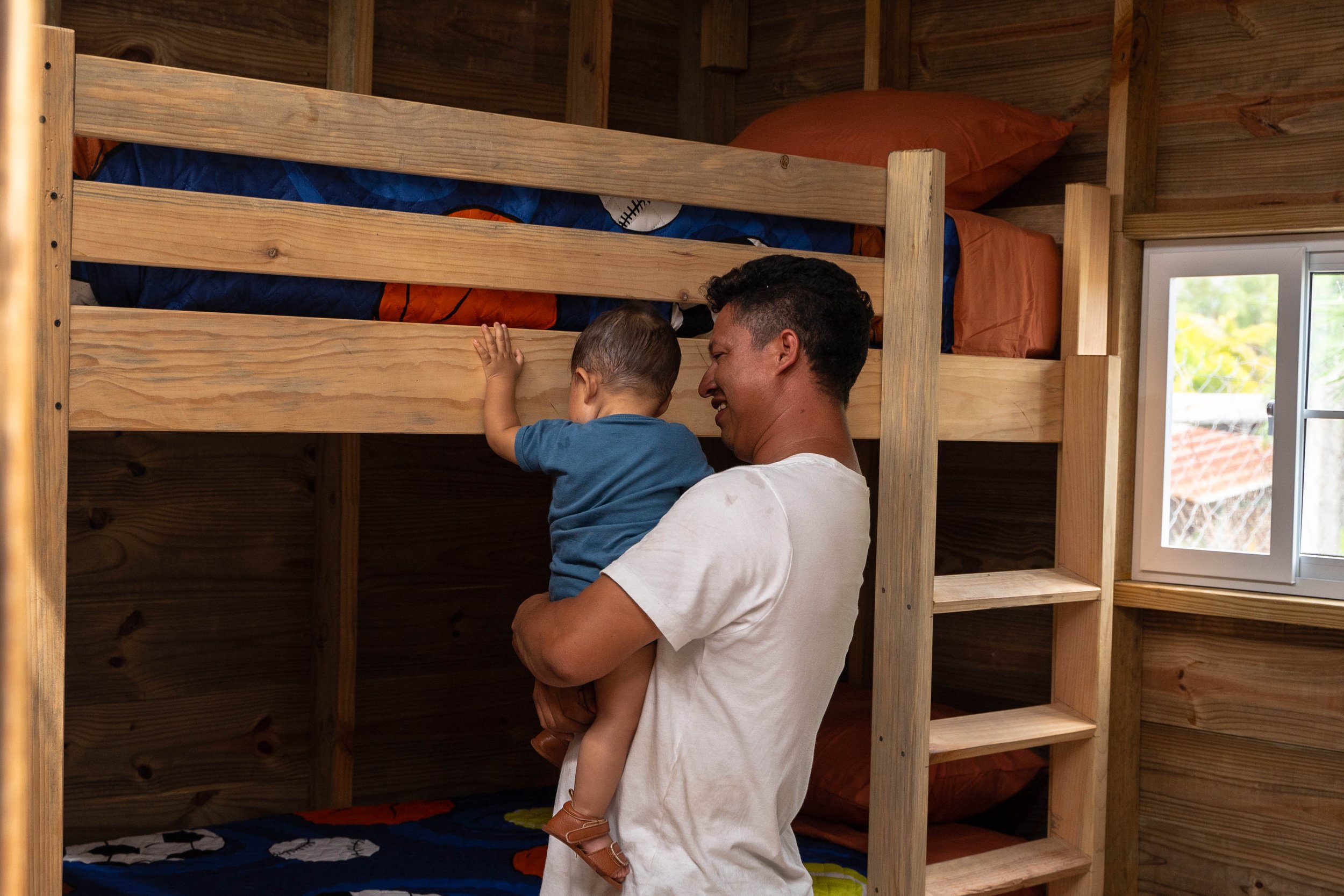 A nurse smiles while providing care to a young girl during a serve hope christian academy health check-up, reflecting the importance of holistic student well-being.