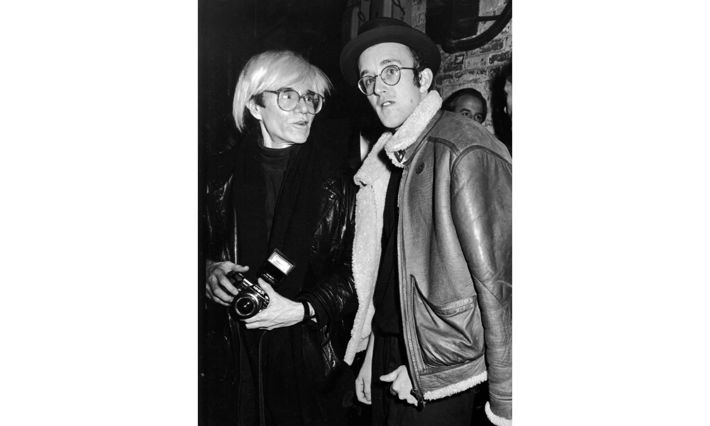 Andy Warhol and Keith Haring at Claes Oldenburg Guggenheim Party, 1986 © Ron Galella