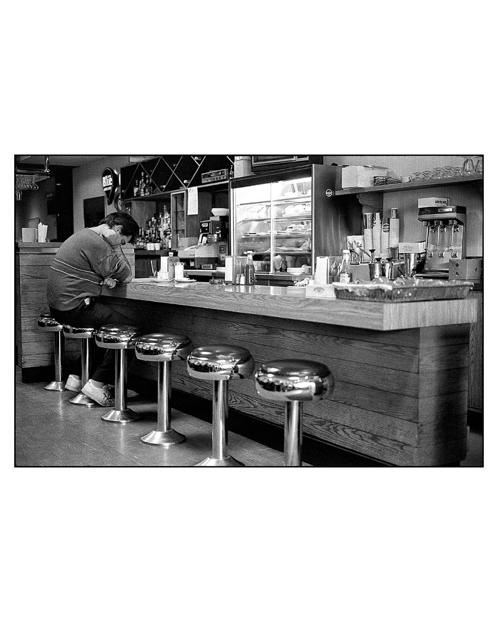 Aloneatthediner counterToronto 1989©DaveGreen-border.jpeg