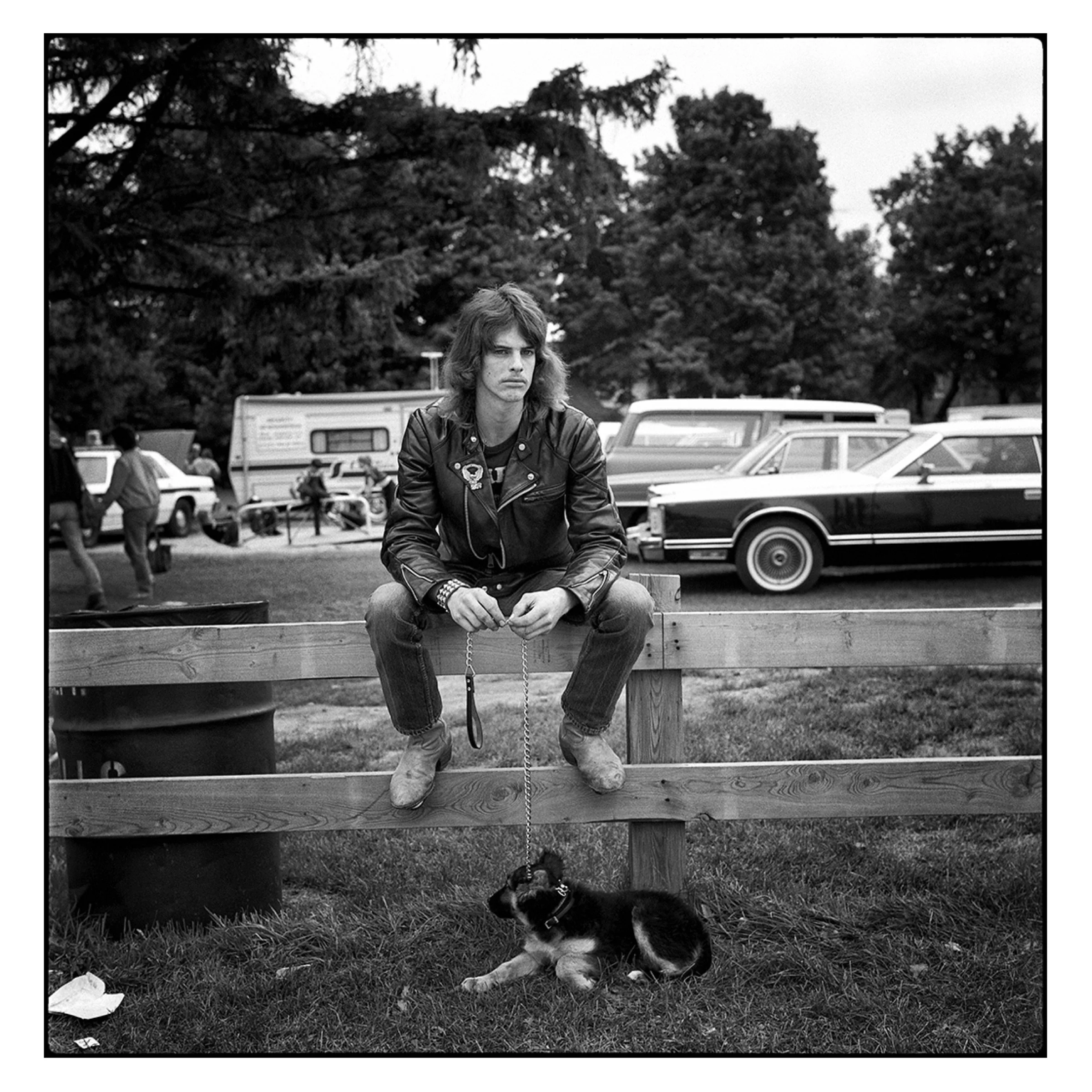 A man and his puppy at a fall fair in Southern Ontario, 1988 © Dave Green