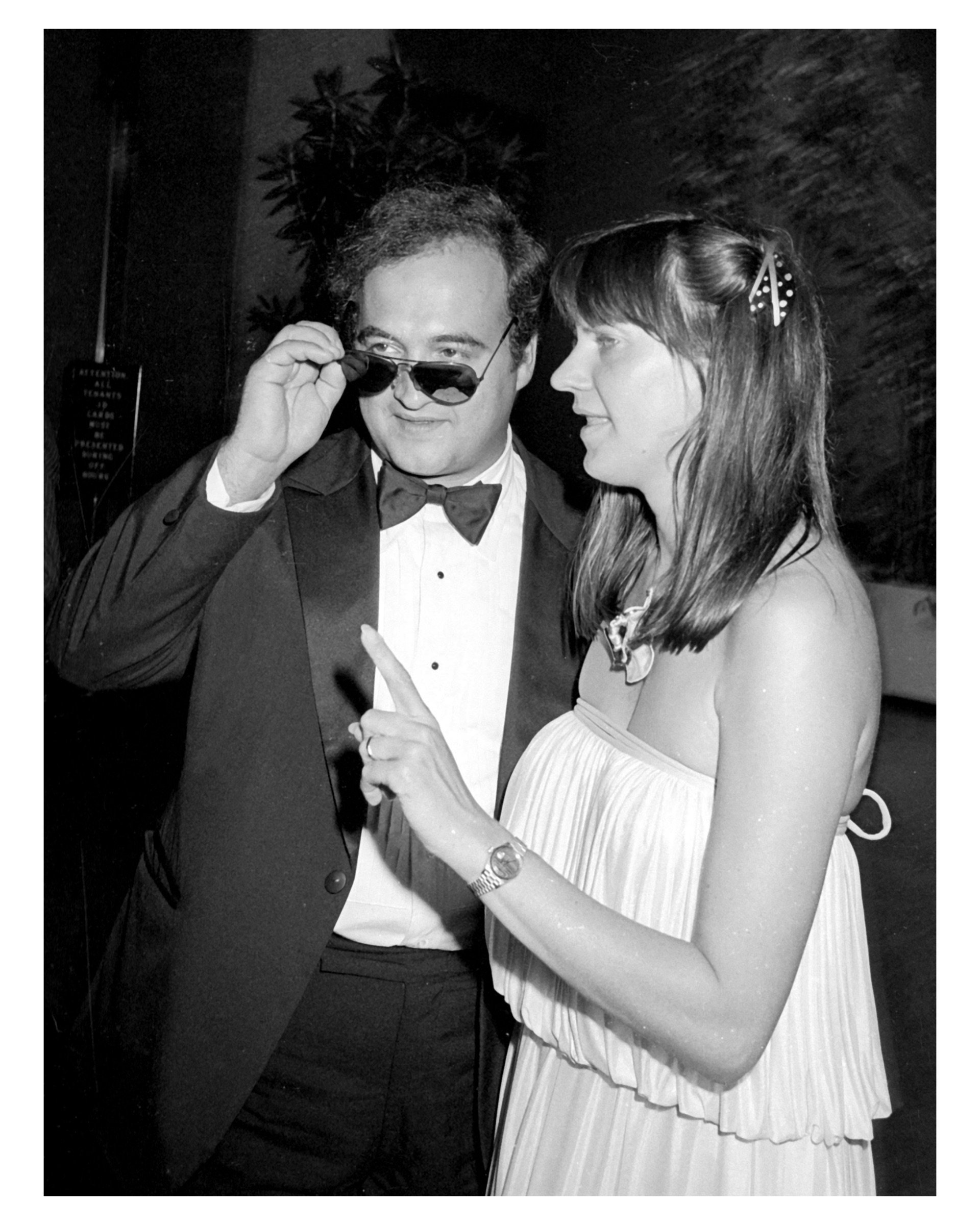 John Belushi and Wife at Dinner Dance Honoring "New York, New York," Olympic Towers, NYC 1981 © Ron Galella