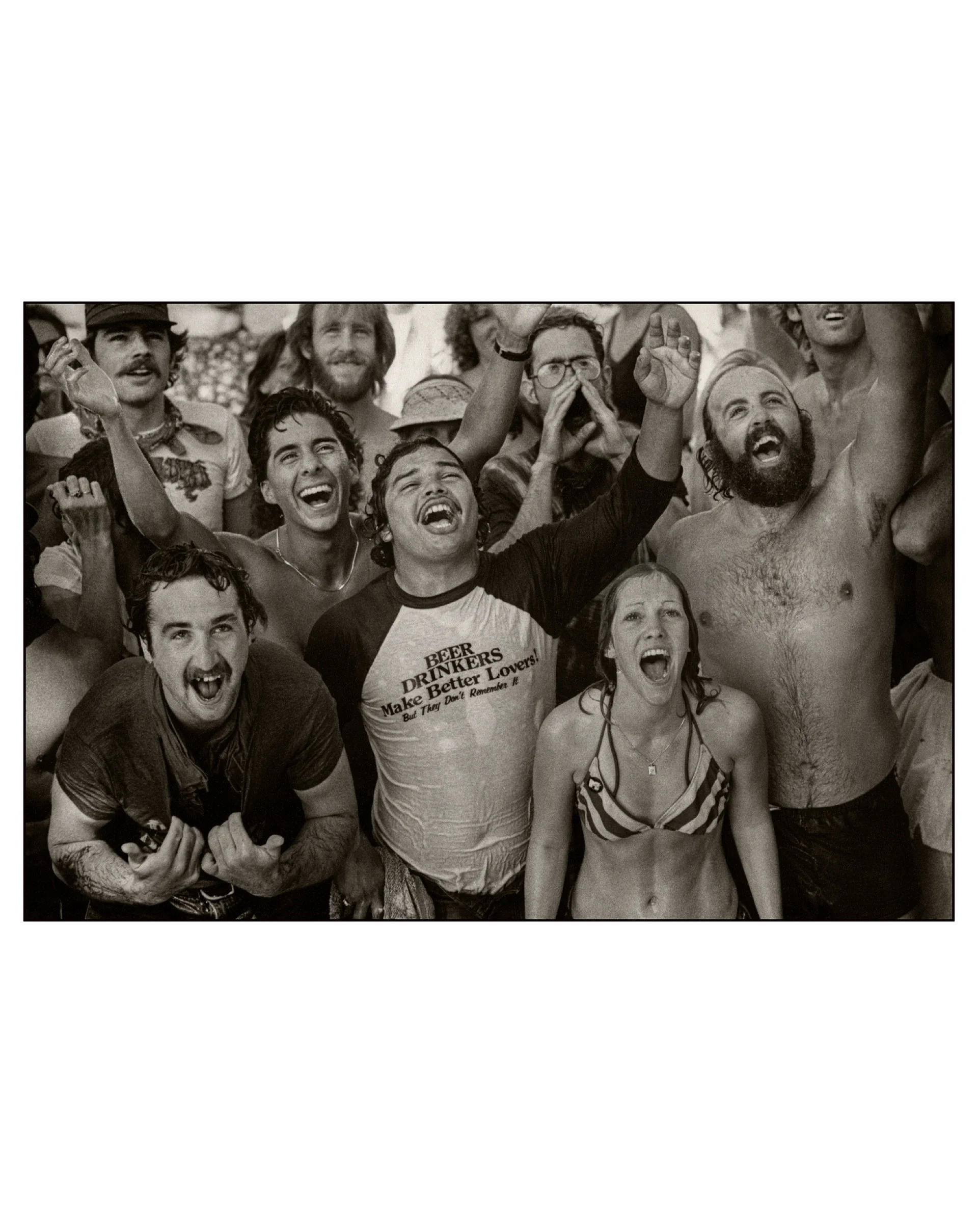 Concert Goers Pleading to be Showered with a Water Hose, The Us Festival, San Bernardino, CA 1982 © Saul Bromberger & Sandra Hoover