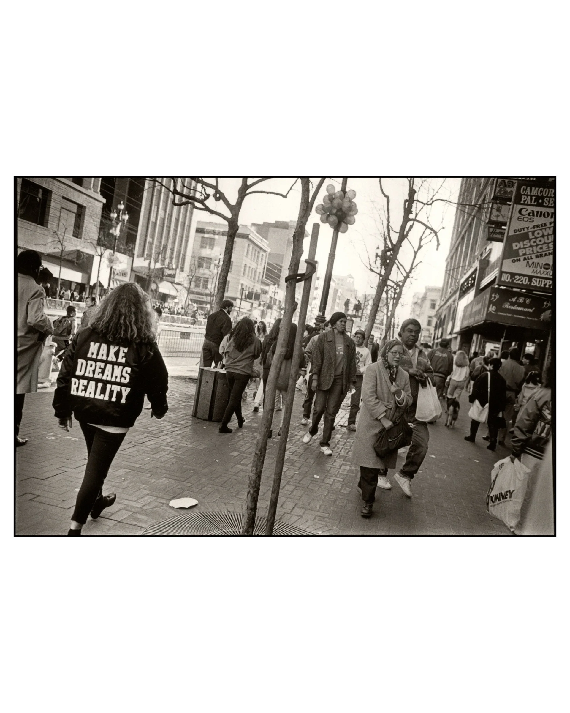 Make Dreams Reality, Market Street, San Francisco, CA, 1989 © Saul Bromberger & Sandra Hoover