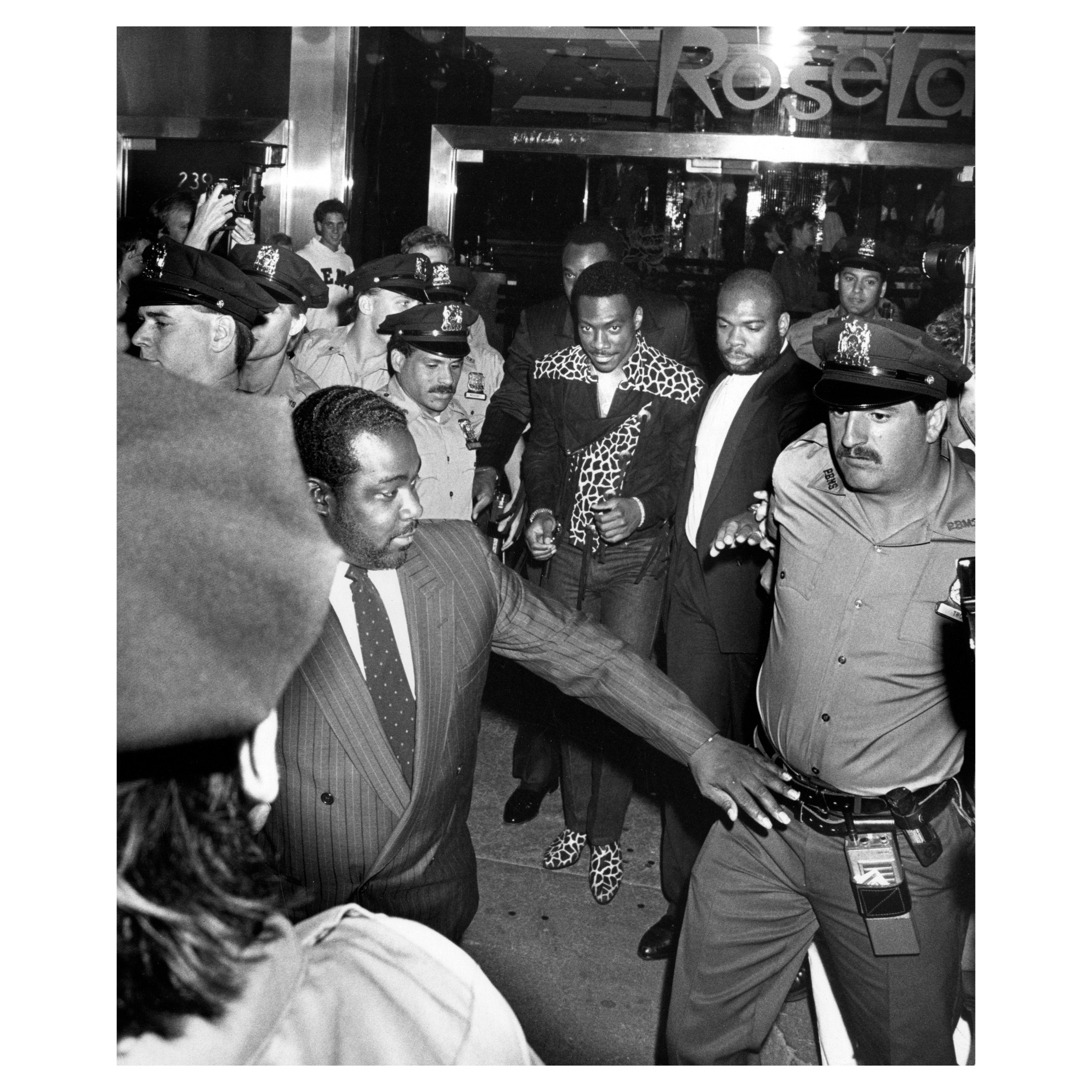 Eddie Murphy and Bodyguards during "Untouchables" Premiere at Loews Astor Plaza, New York City, 1987 © Ron Galella 