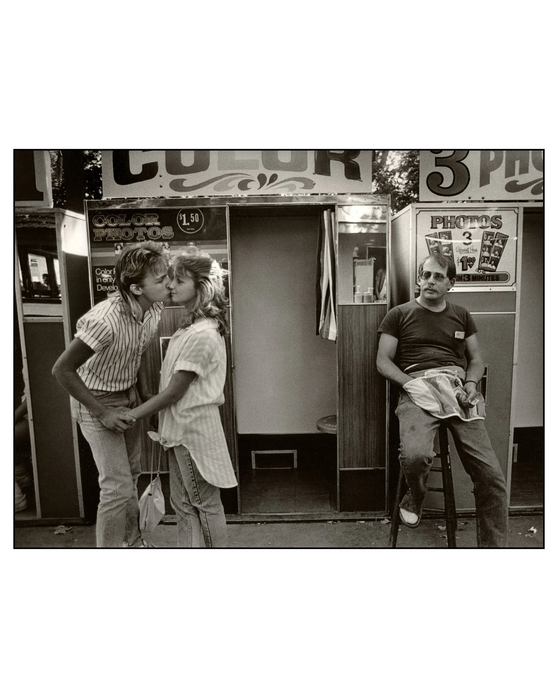 Teenage Couple at the Photo Booths, Alameda County Fair, Pleasanton, CA, 1986 © Saul Bromberger & Sandra Hoover