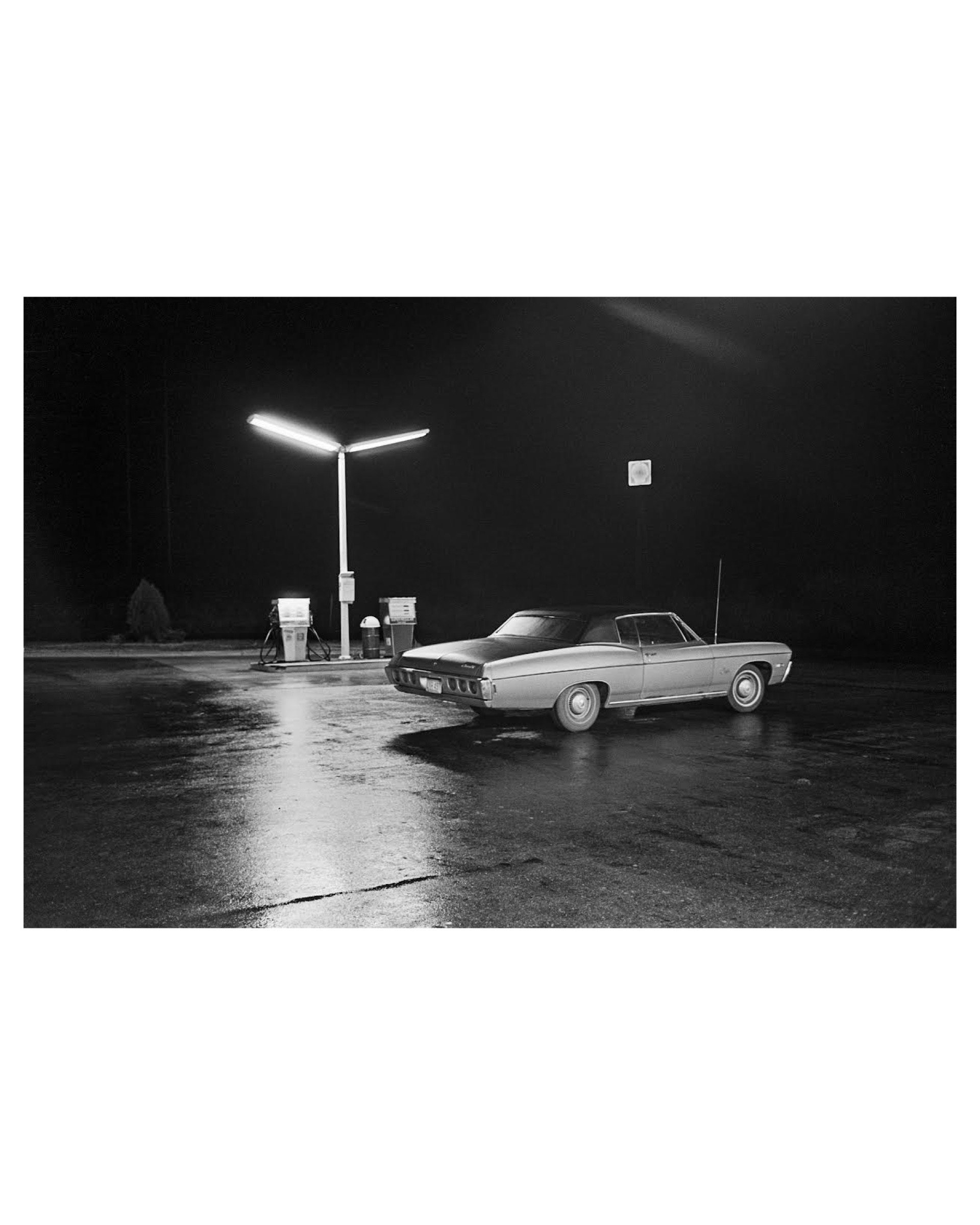 Chevy at Gas Station, Michigan, 1973 © Don Hudson