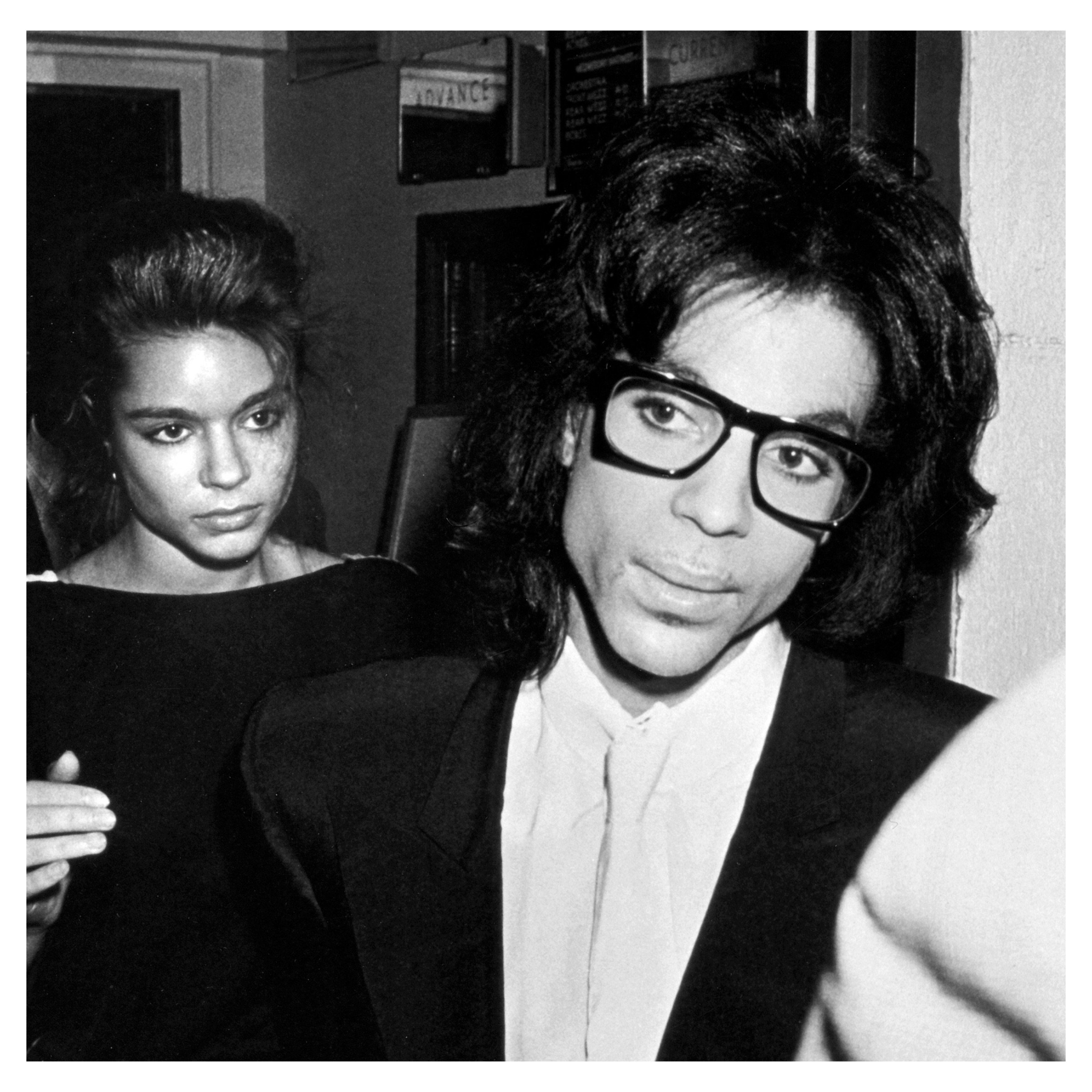 Prince and date attending a performance of "Madame Butterfly" at the Euguene O'Neill Theater, New York City, September 21, 1988 © Ron Galella