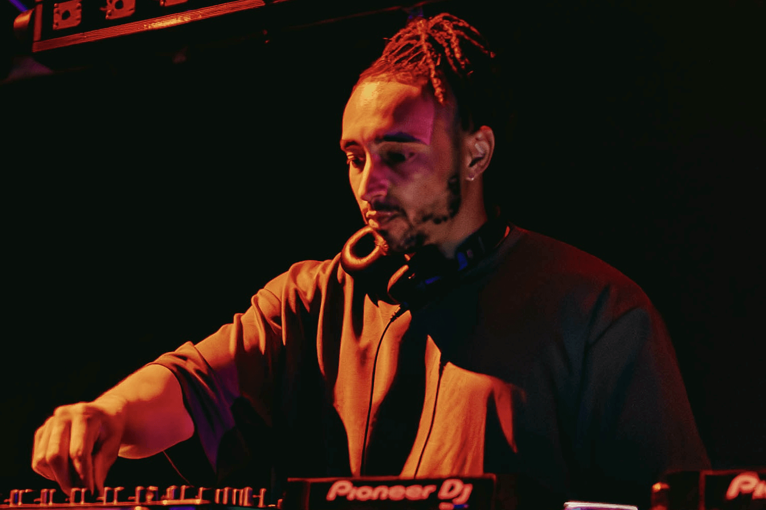 DJ Otik playing on Pioneer DJ equipment at club