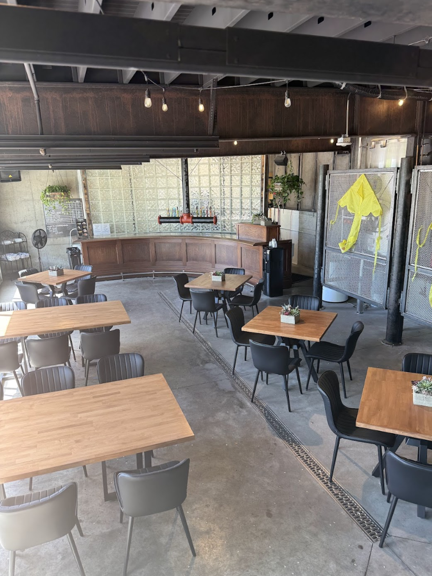 Close-up of the Barrel Room's rustic charm: Showcasing the warm ambiance and stylish barrel-themed design, perfect for events requiring a touch of sophistication.