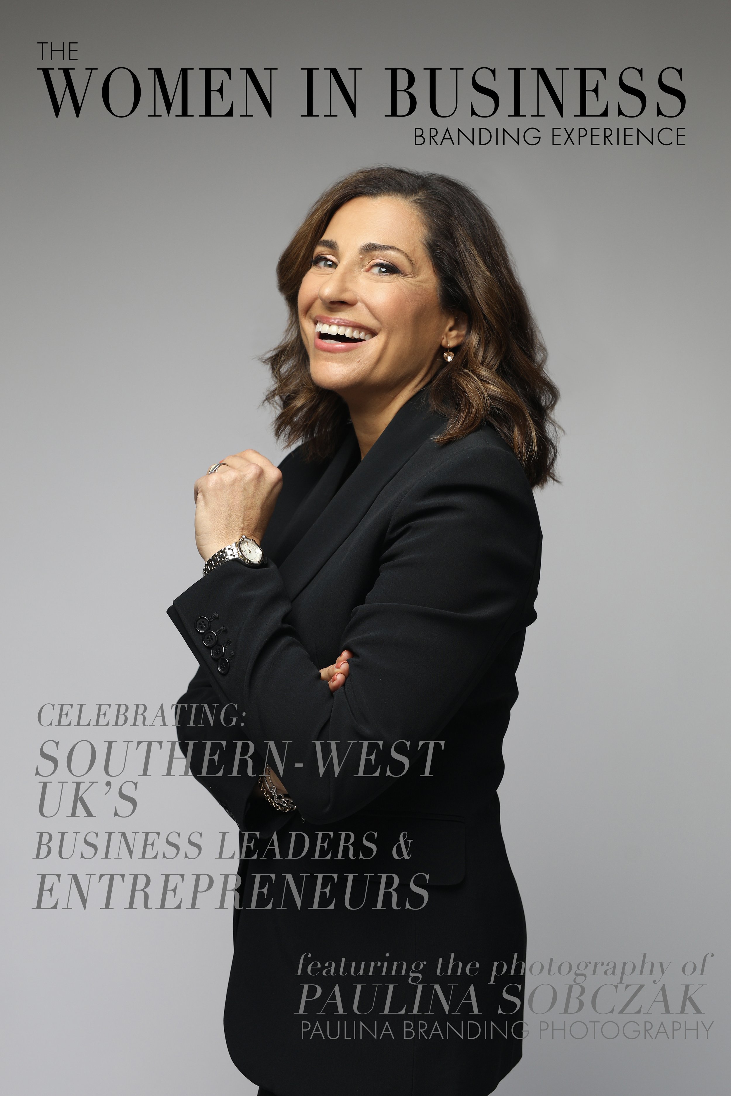 Capture the charisma of this Italian woman with a radiant smile and a confident pose. Dressed in a sophisticated dark suit, she exudes professionalism and charm, as well as know it all. With her arms crossed at chest level, she projects a sense of co